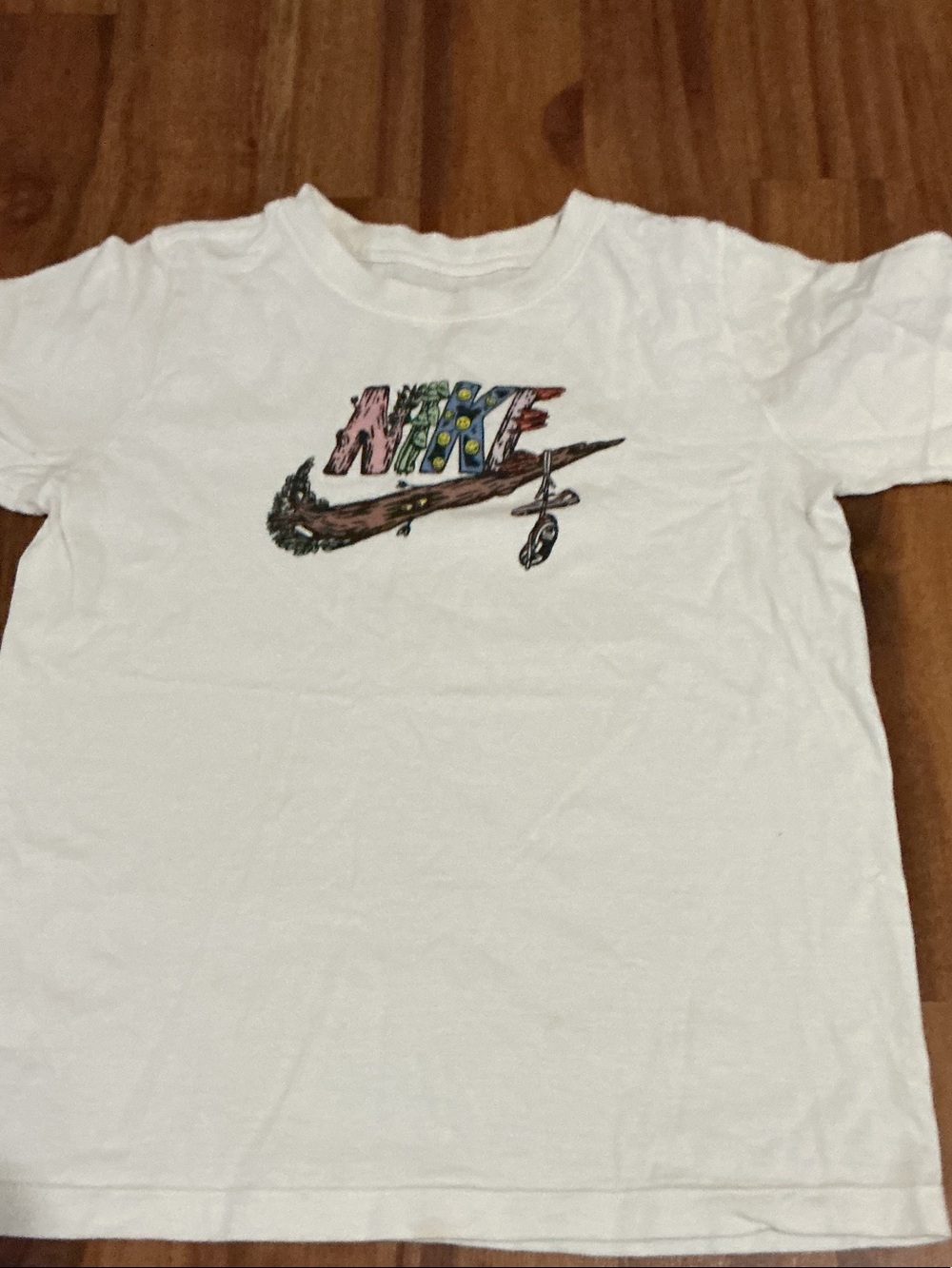 Nike White Short-Sleeve Tee with Multicolor Graphic Logo Large kids great